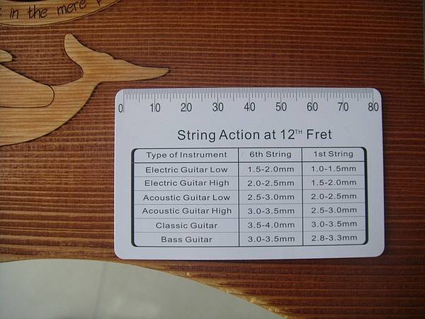 怎样调节吉他的手感至最佳状态