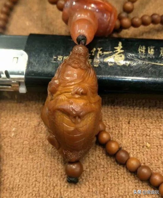 橄榄核雕如何开裂得快点图片,橄榄核雕如何开裂得快一点图片