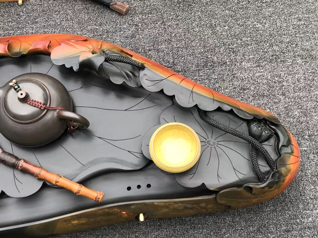 人工雕刻石茶盘,小伙子石头雕刻二十万