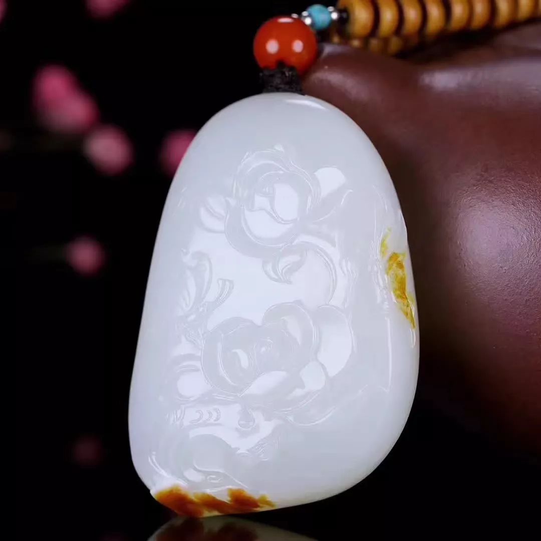 把玩和田玉和玻璃的区别,把玩和田玉生肖