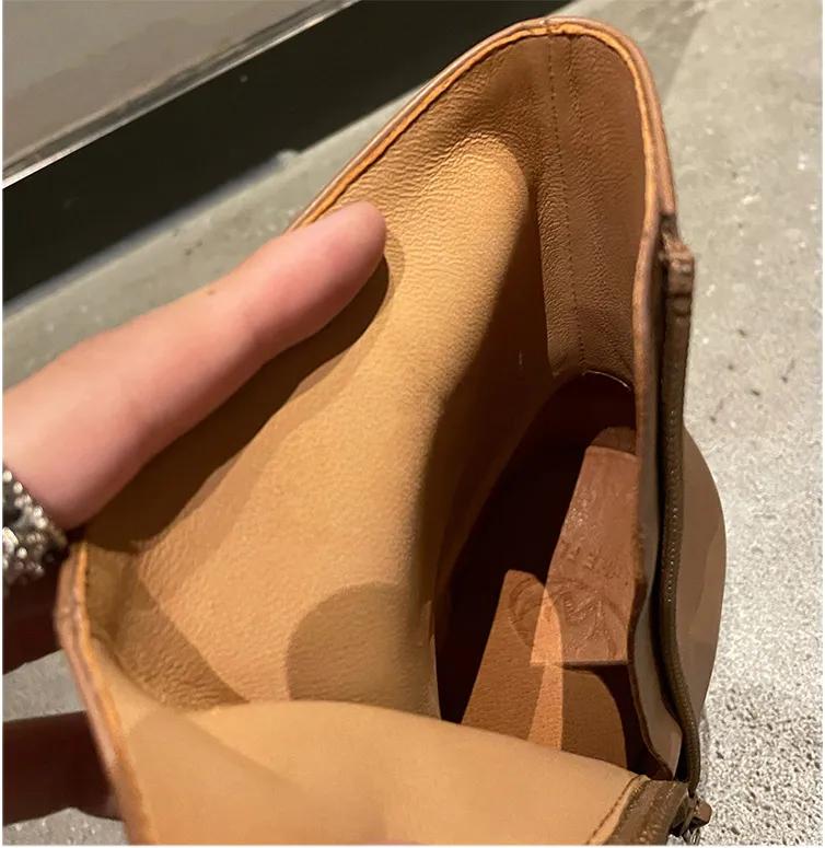 时髦大气的短靴整个look气场提升,牛仔裤短靴入冬正流行好看又高级