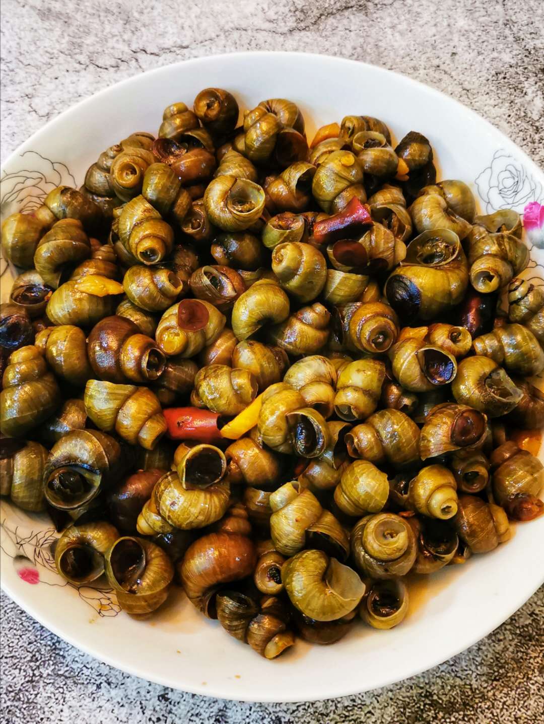 怎么挑螺蛳肉更快更好吃,螺蛳用什么方式做螺蛳肉