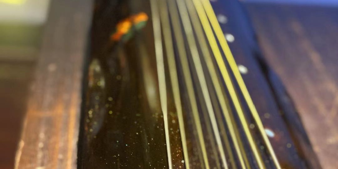 古琴调琴老回弹怎么办,古琴上弦后固定不了滑扣怎么办