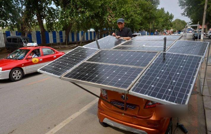江苏牛人造出太阳能汽车不加油,长发小伙造太阳能汽车
