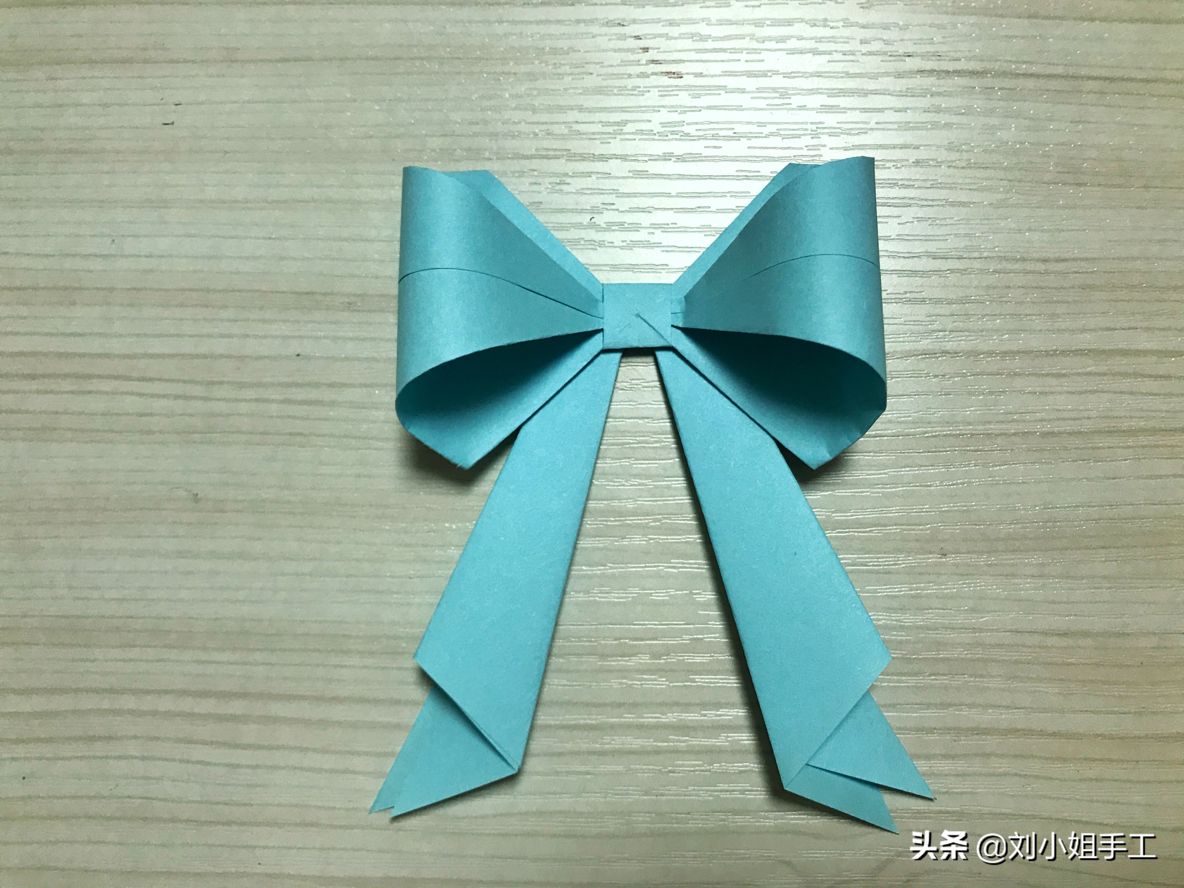 礼物盒包装上的蝴蝶结系法,礼物包装教程丝带蝴蝶结