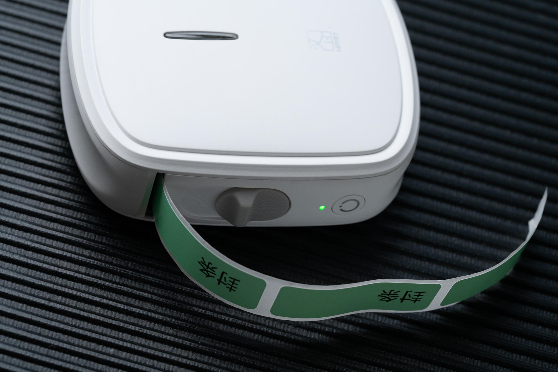 汉印hprtq2标签打印机装纸教程,汉印便携式小标签打印机使用方法