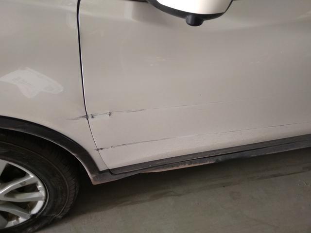 车门掉一块漆大概多少钱,车门撞掉漆了修理要多少钱