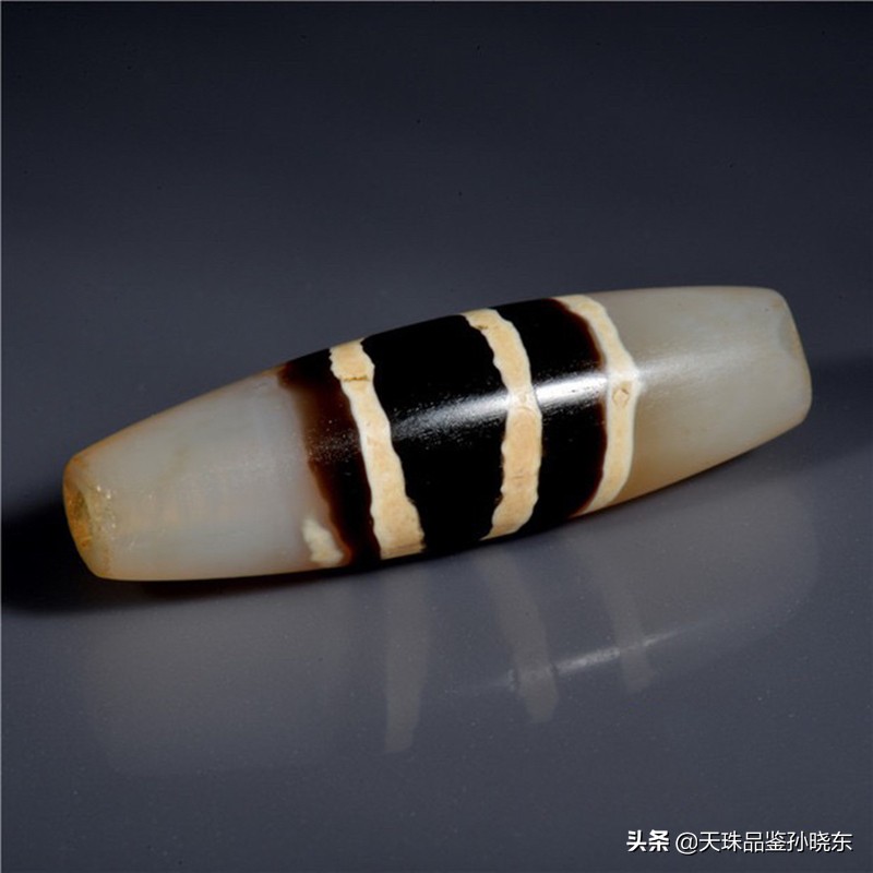 网上几块钱买的天珠都是什么材质,市面上几百块的天珠