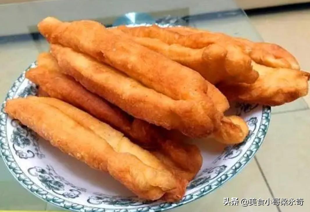 油条膨松剂怎样炸出蓬松的油条,怎么才能让油条炸得蓬松