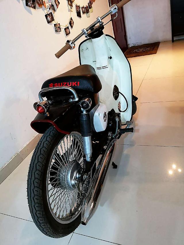 本田摩托车幼兽70c,改装老款铃木摩托