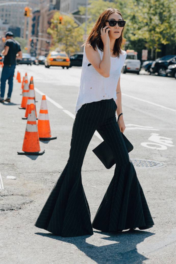 阔腿裤和喇叭裤哪个更时尚 (阔腿裤垂直感开叉喇叭裤)