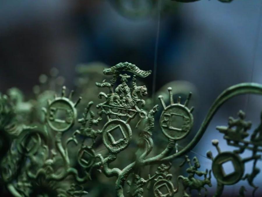 川蜀特产青铜摇钱树究竟有何用途,祭祀、陈设、还是明器?