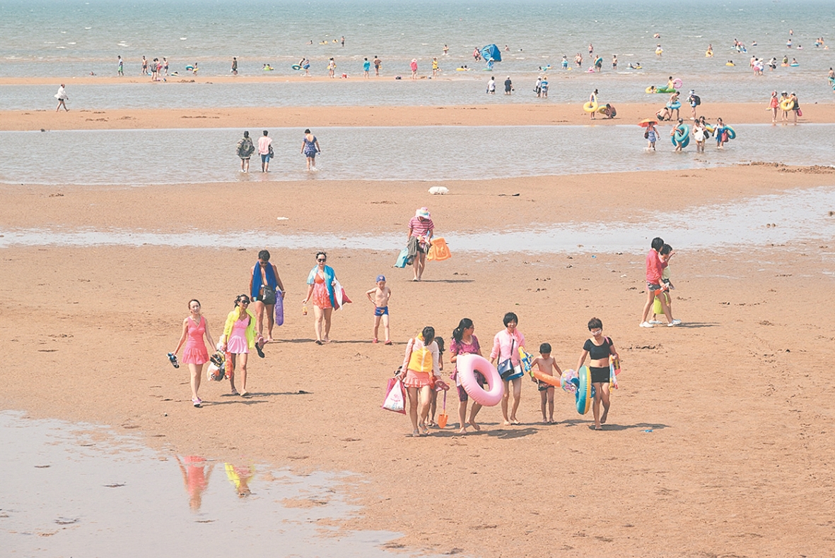 中国大陆唯一可观夕阳坠海的城市,营口是夕阳坠海的城市