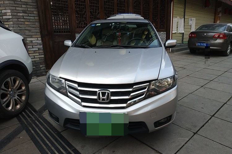 本田锋范经典2014款多少钱,人生中第一辆新车感悟