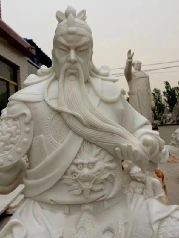 云南石雕关公人物雕像,关公雕像佛纹寓意