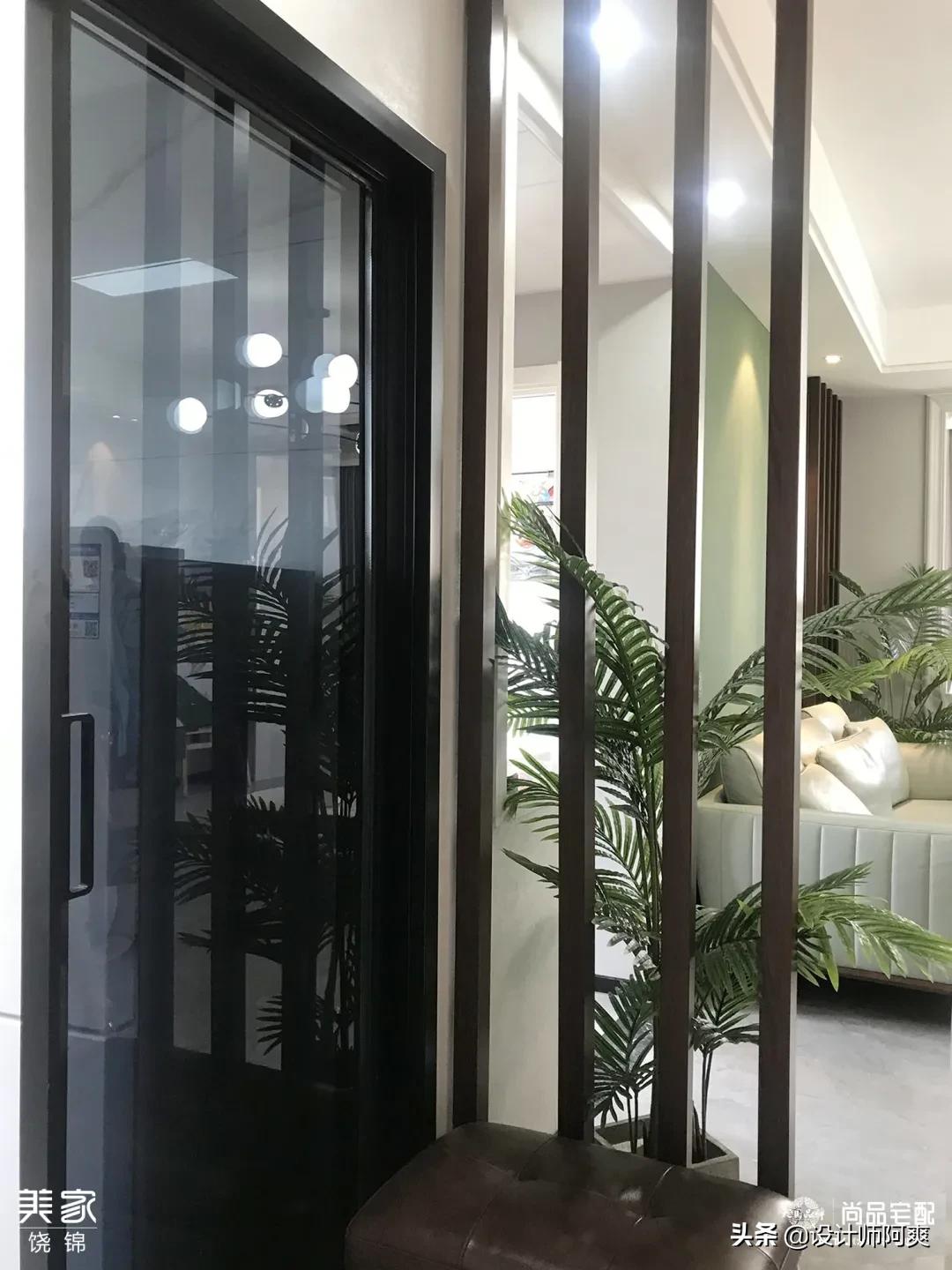 大门正对客厅一体隔断,入户正对客厅餐厅玄关隔断效果图