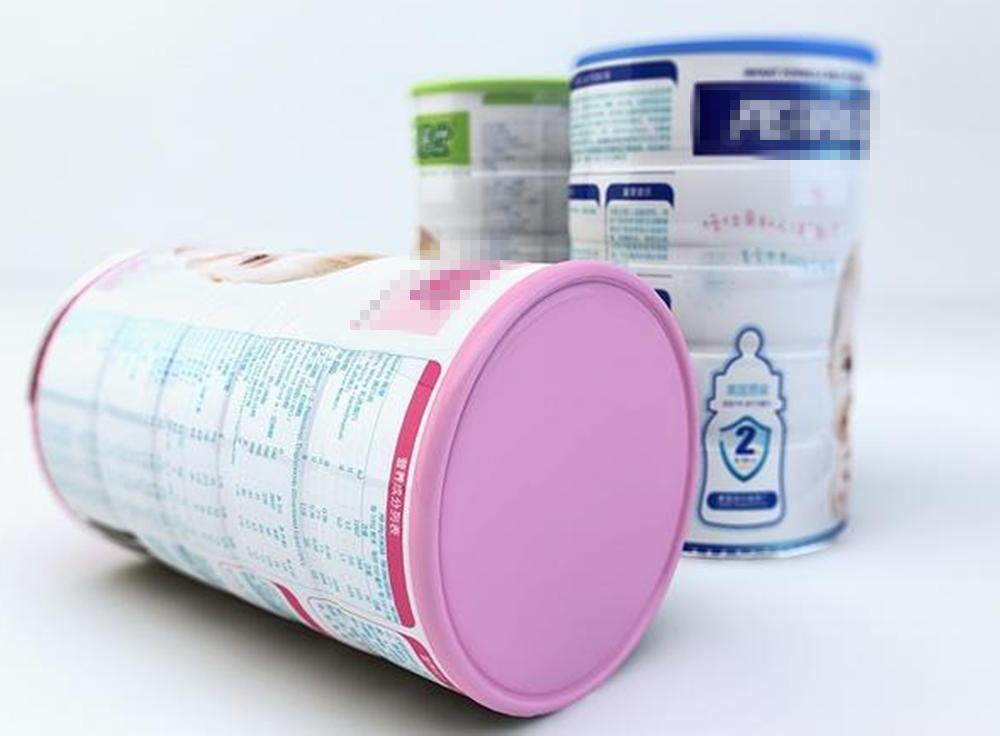 有些奶粉勺子为什么在奶粉里面,奶粉的小勺底部为什么有个小洞