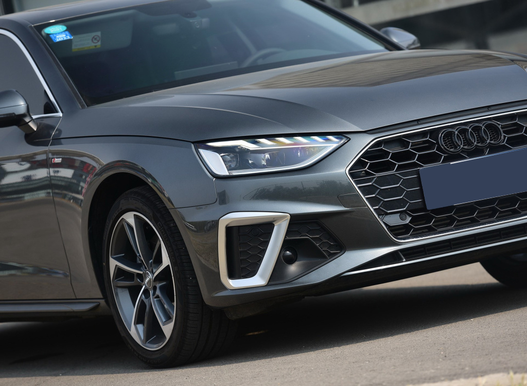 奥迪a4l乞丐版值得购买吗,全款买奥迪a4l豪华动感送什么