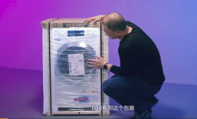 手动滚筒洗衣机开箱视频,全自动洗衣机打开图片