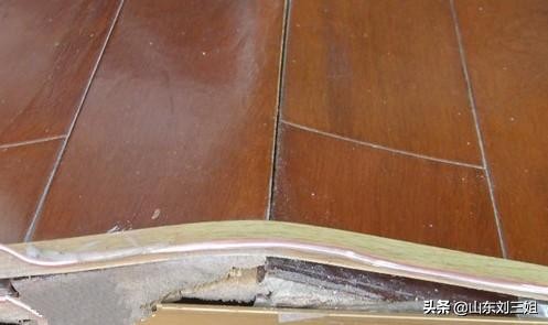 强化木地板被水泡了起鼓如何修复,木地板起翘补救方法视频