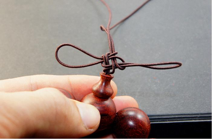 弹力绳穿珠子收尾打结方法,手串绳隔珠结的打结方法