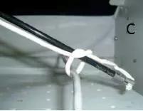 腹腔镜下打结的方法,腹腔镜推结器打结方法视频