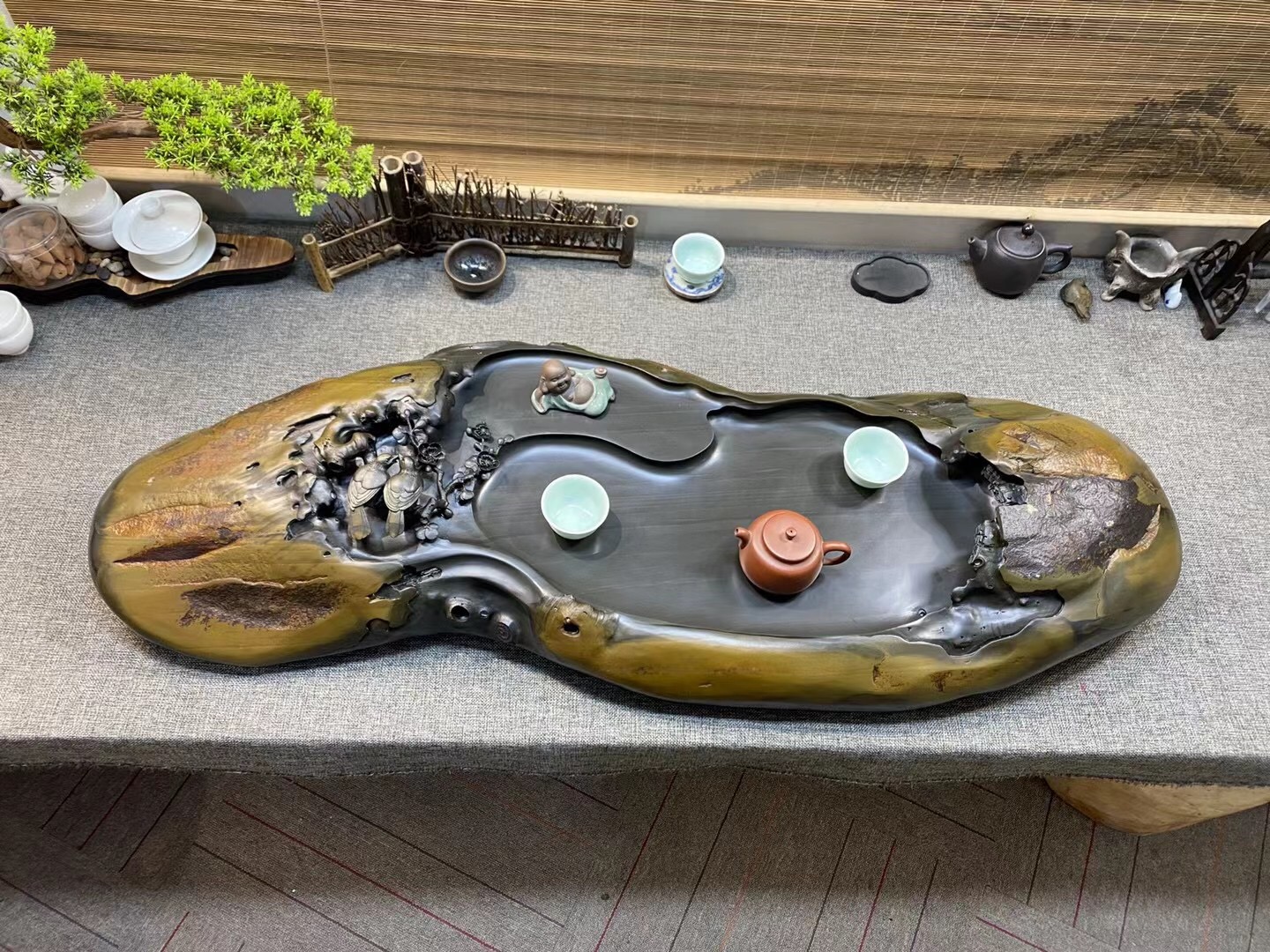 树桩石头雕刻高山流水,把石头雕成蝴蝶