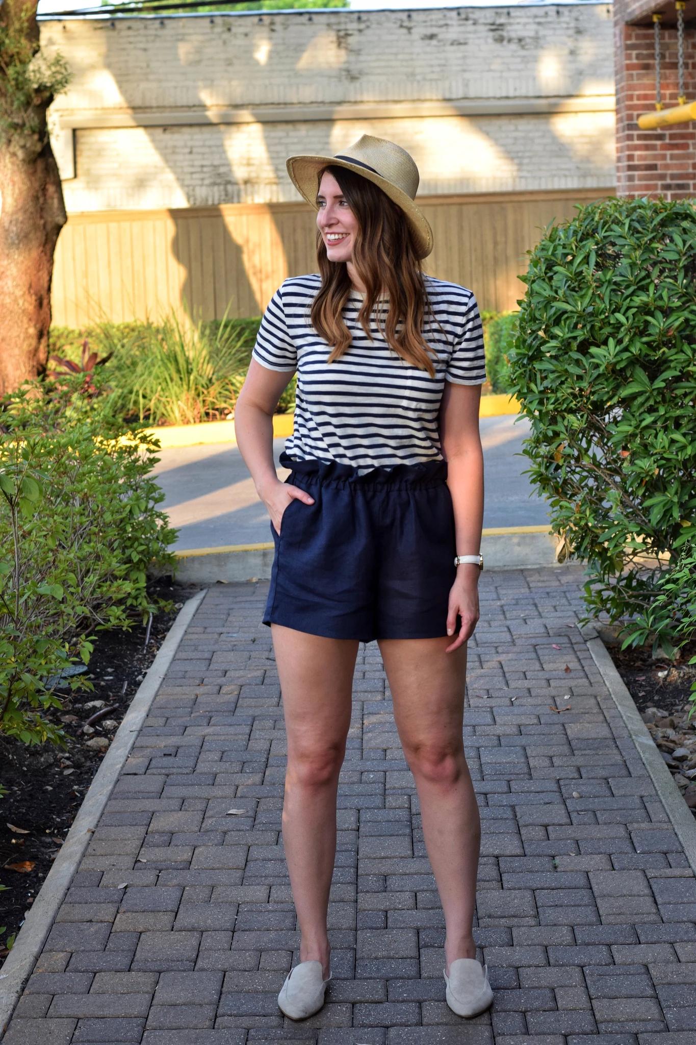 短裤一根布腰带的系法,短裤的一条裤带怎么系