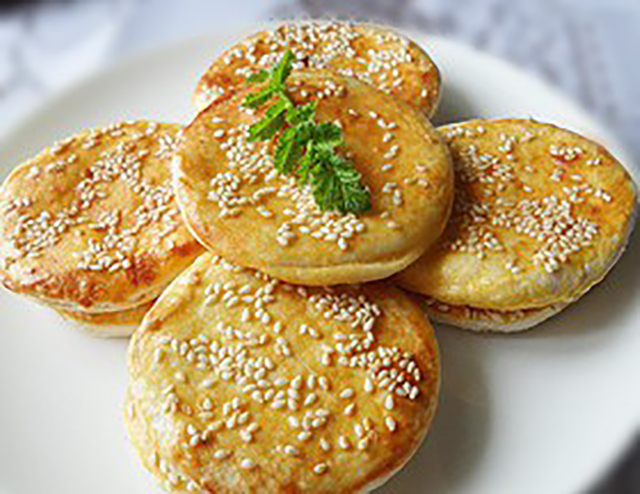 山西美食介绍太谷饼20字,山西大同胡麻油太谷饼