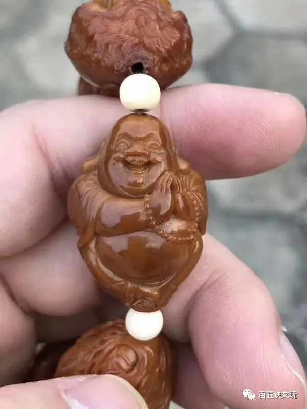 橄榄核雕如何分辨机雕和手修,橄榄核雕有黄斑怎么处理