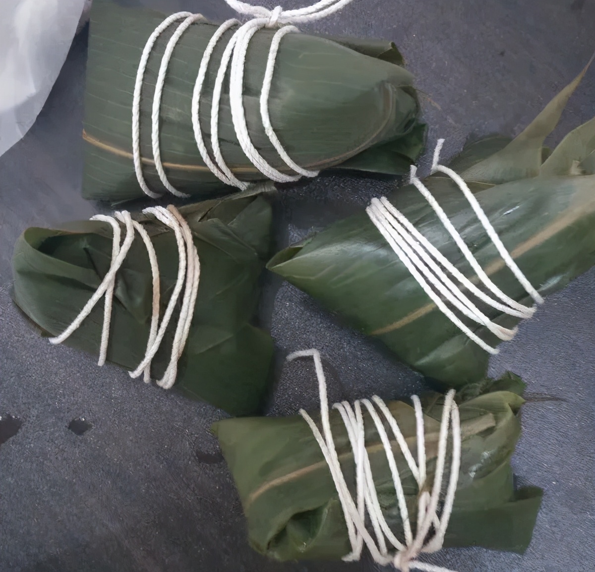 粽子怎么能包的特别紧不漏米,煮粽子时为何会出现粽子夹生现象