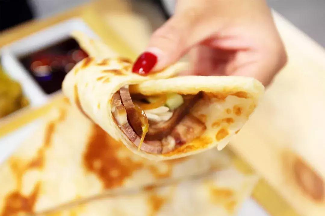 门头沟烧饼夹肘子石门营,门头沟特色小吃烧饼夹肘子