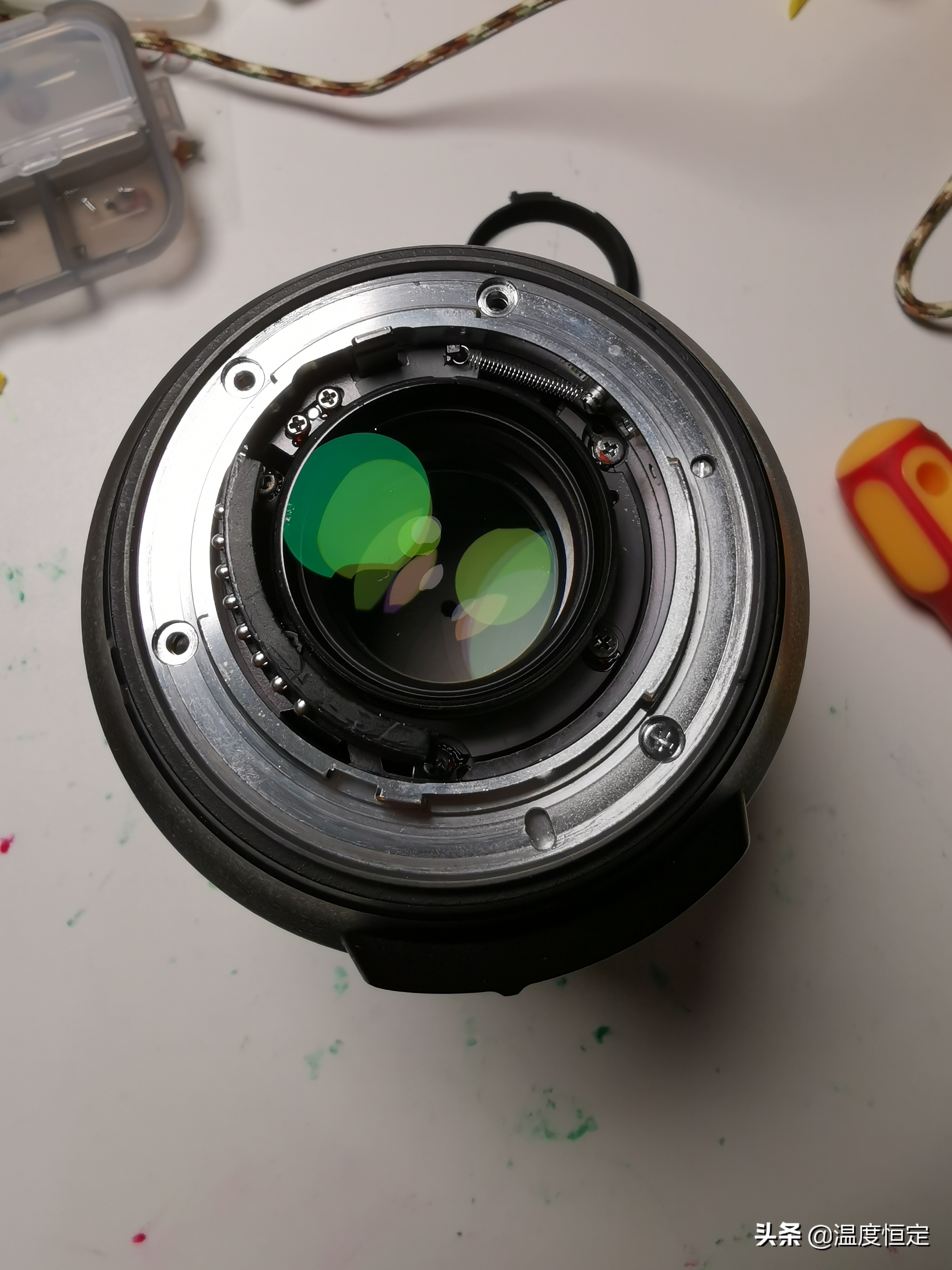 尼康镜头防抖打开一直响,尼康24-120镜头防抖怎么开