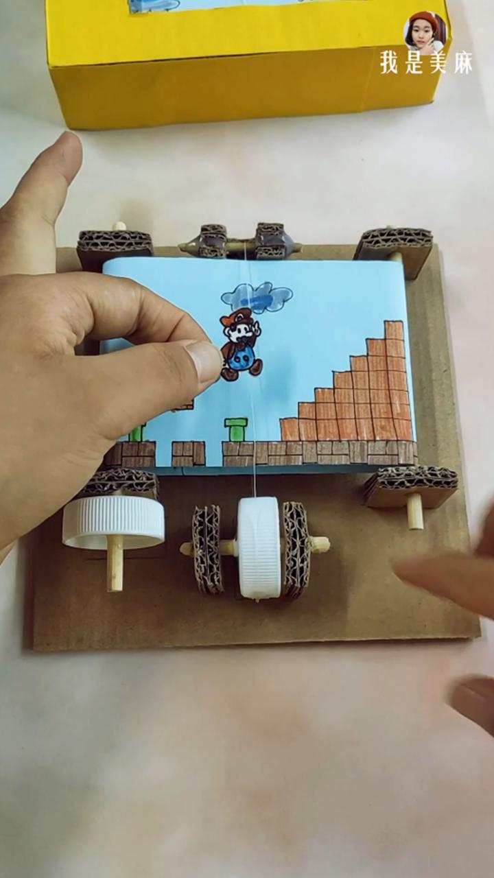 一个快递盒做了一个玩具,一个纸箱做一个游戏机