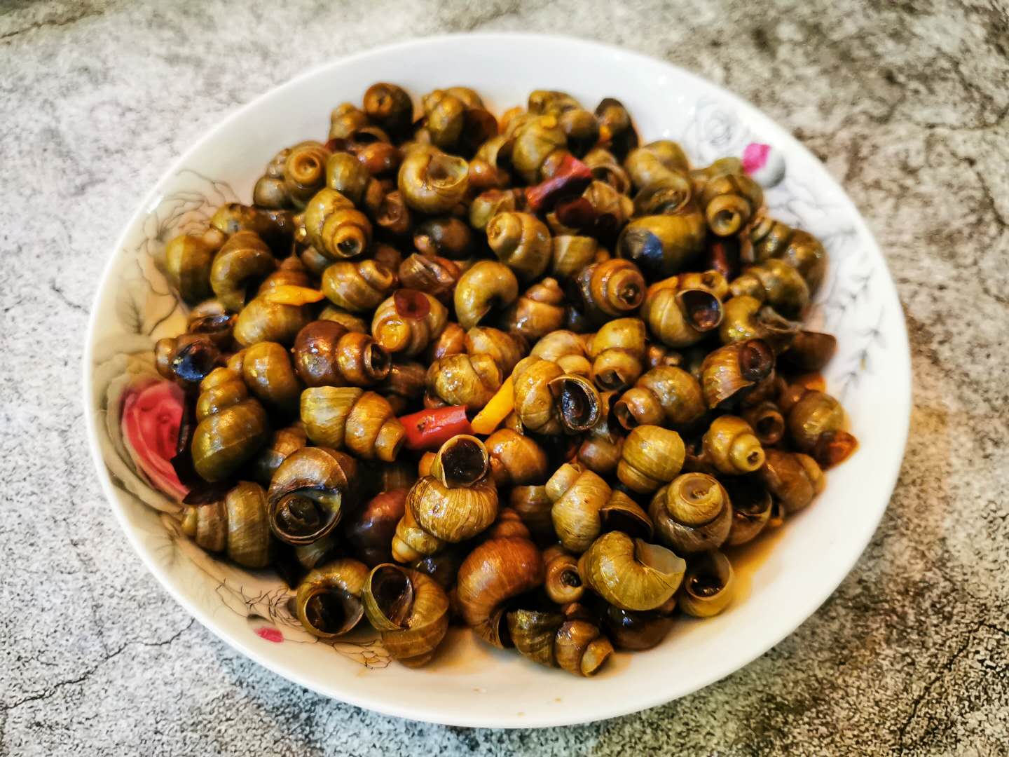 怎么挑螺蛳肉更快更好吃,螺蛳用什么方式做螺蛳肉