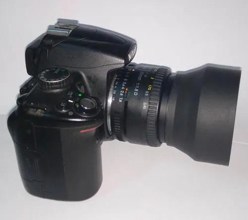 尼康镜头50mmf1.4和1.8区别,尼康5018d拍人像如何