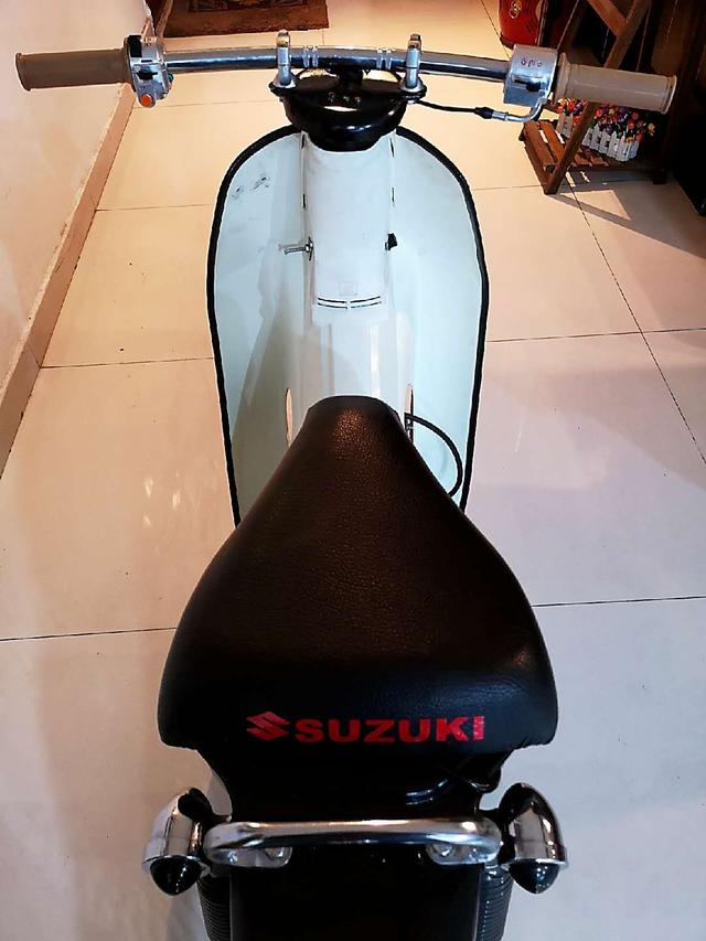 本田摩托车幼兽70c,改装老款铃木摩托