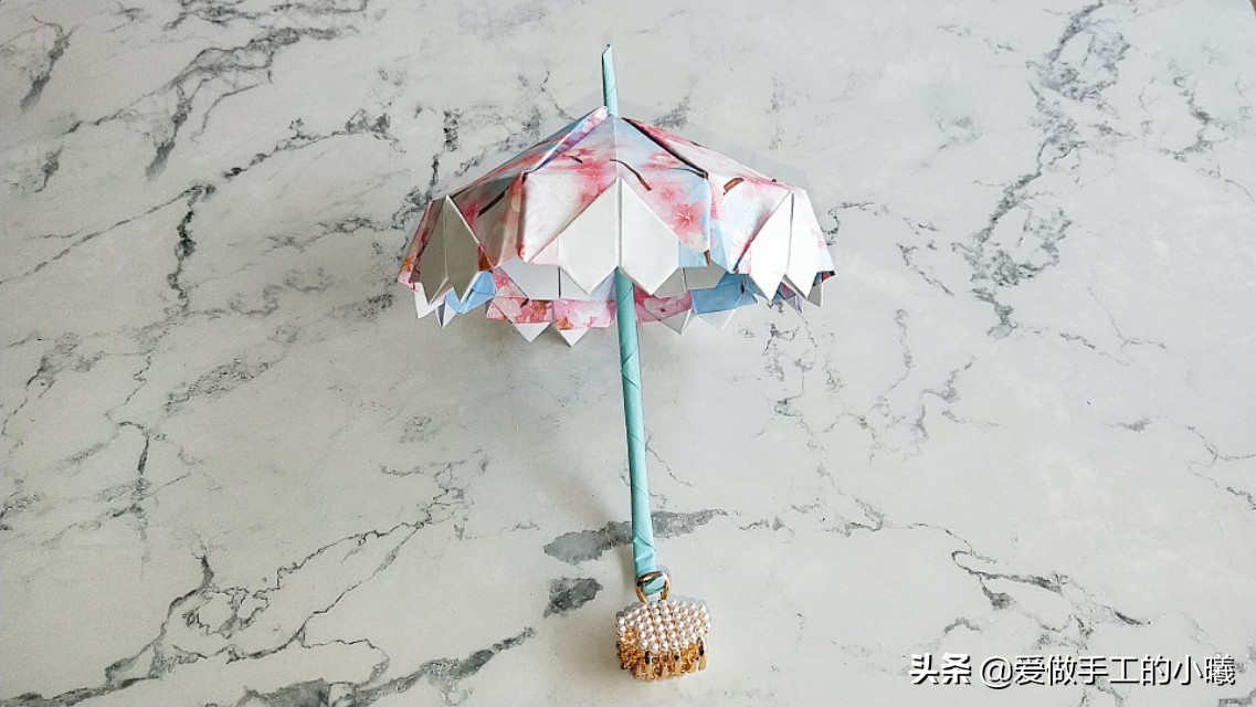 古风雨伞折纸小花伞,折纸小花伞的制作过程怎么写
