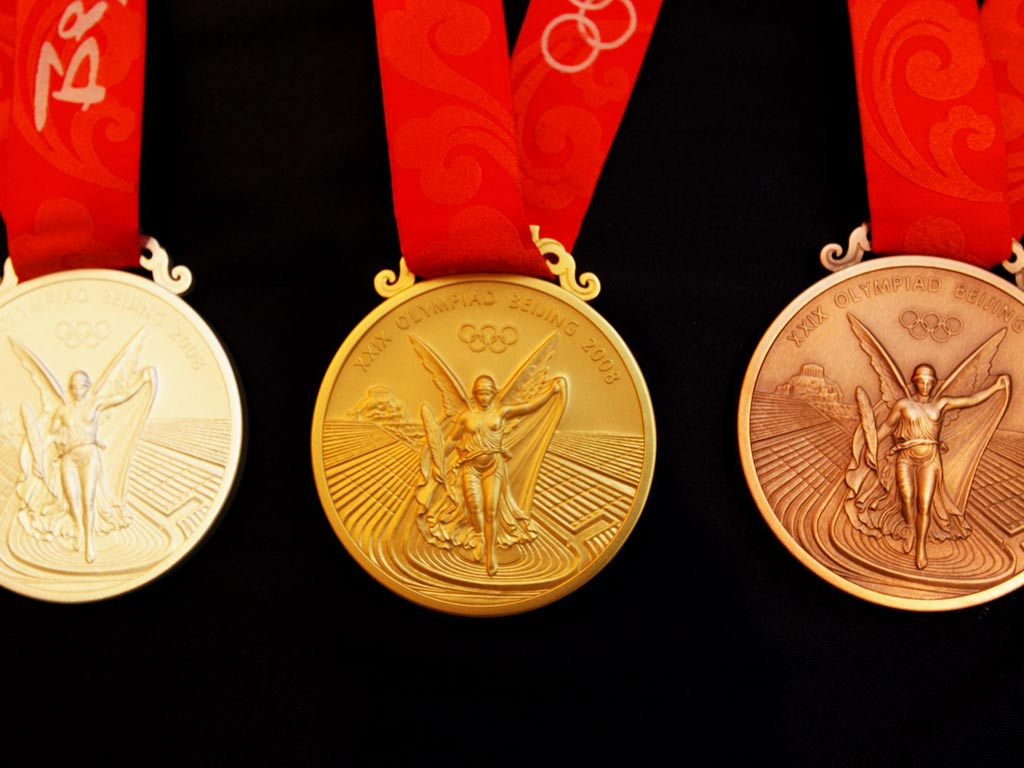 东京奥运金牌是纯金的吗有多重,日本东京奥运金牌多重