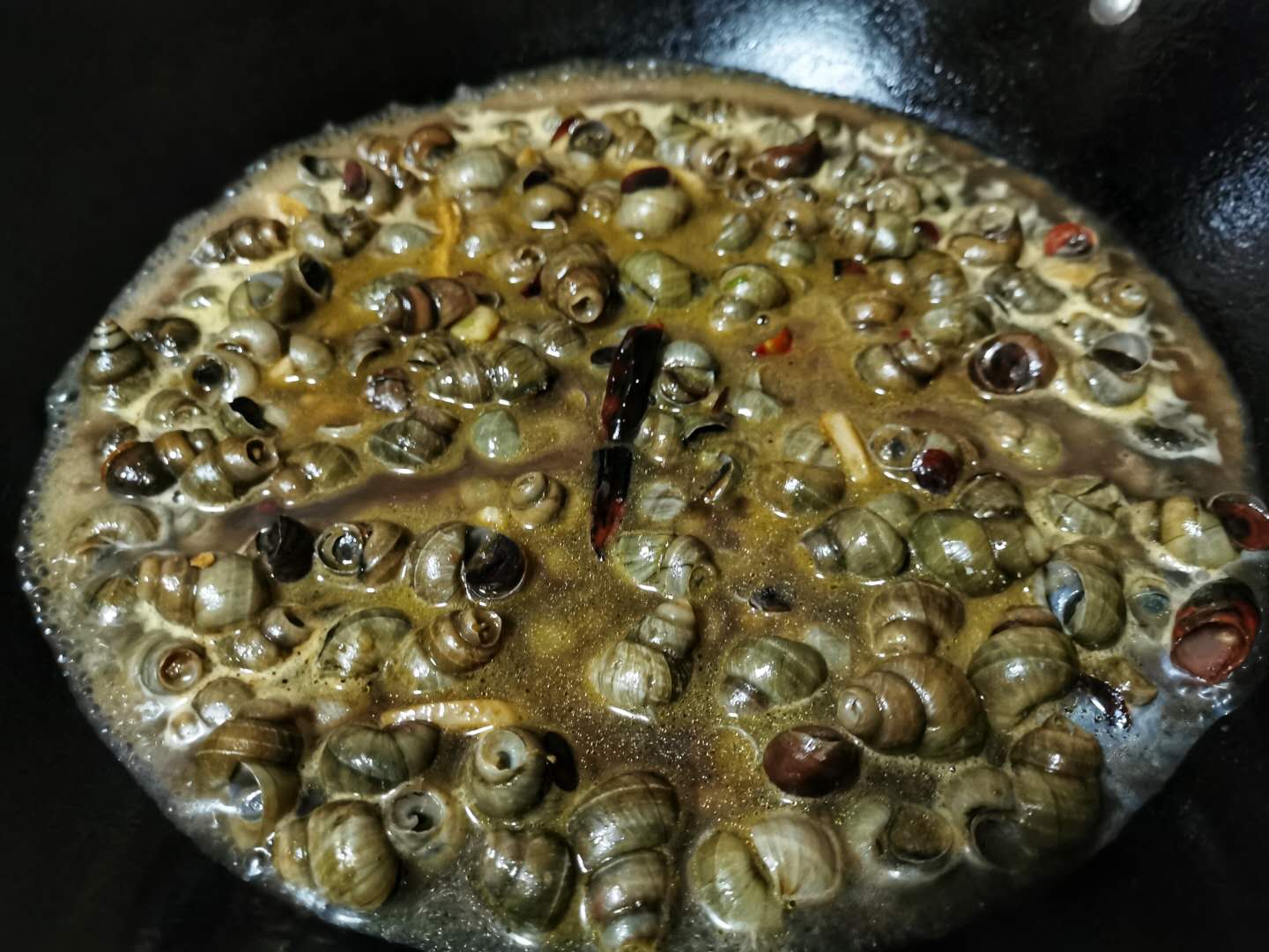 怎么挑螺蛳肉更快更好吃,螺蛳用什么方式做螺蛳肉