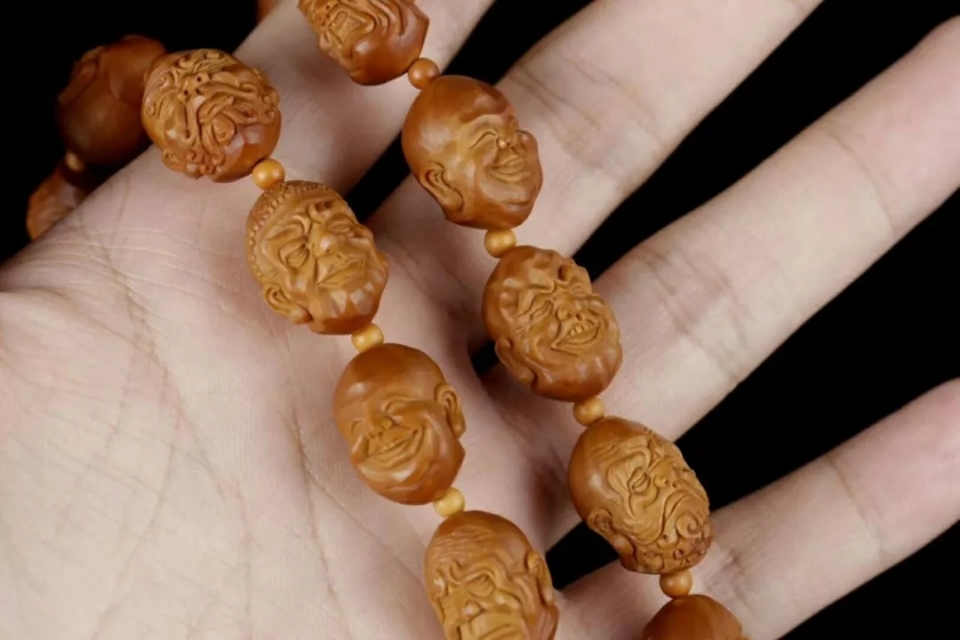 十八罗汉橄榄核怎么按顺序来穿 (核雕十八罗汉怎么区分)