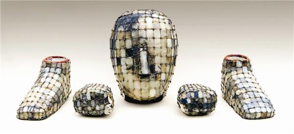 盗墓笔记金缕玉衣是什么时期的,盗墓笔记关于金缕玉衣描述