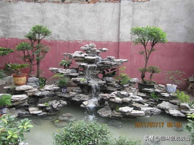 庭院西北方位鱼池假山种什么树,家庭制作假山鱼池在哪个方位好
