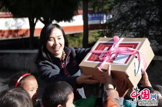 成都信息工程大学银杏酒店管理学院再走山区,续写暖足情