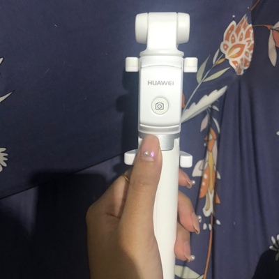 华为有线自拍杆的使用方法及操作,华为手机用自拍杆的使用方法图解