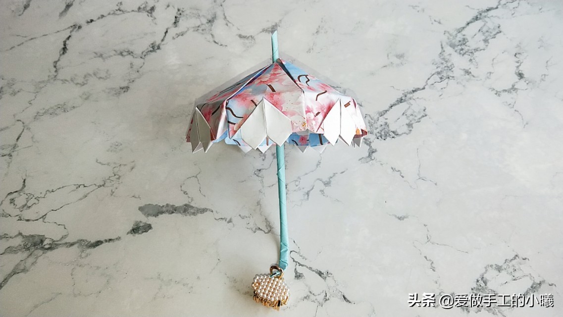 古风雨伞折纸小花伞,折纸小花伞的制作过程怎么写