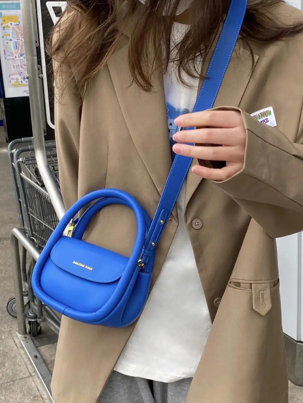 买了一大堆便宜包包,买了一个包回来发现包里有钱