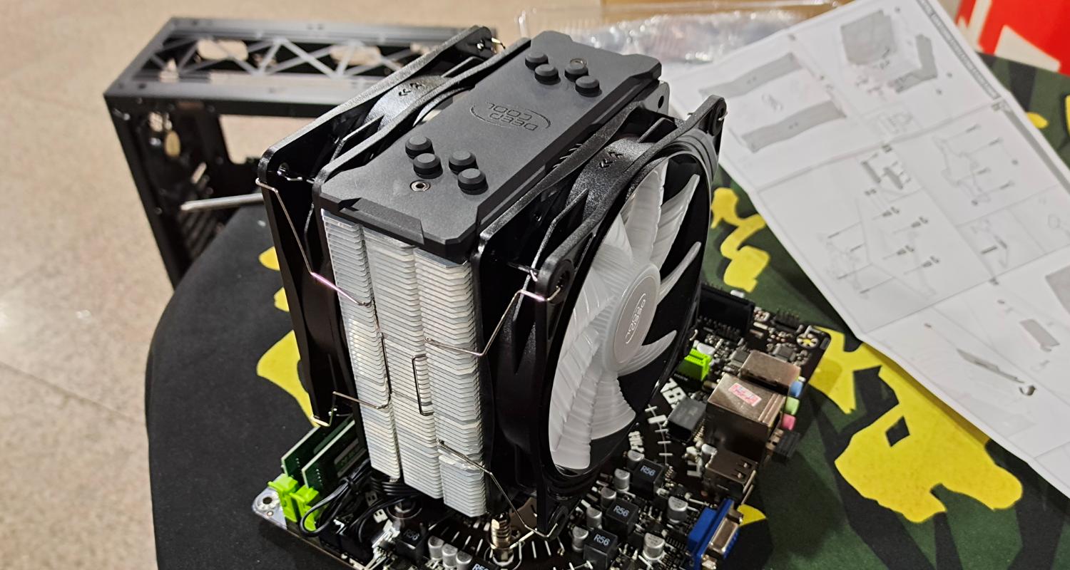 电脑城装机视频教程,九州风神水冷散热器安装过程