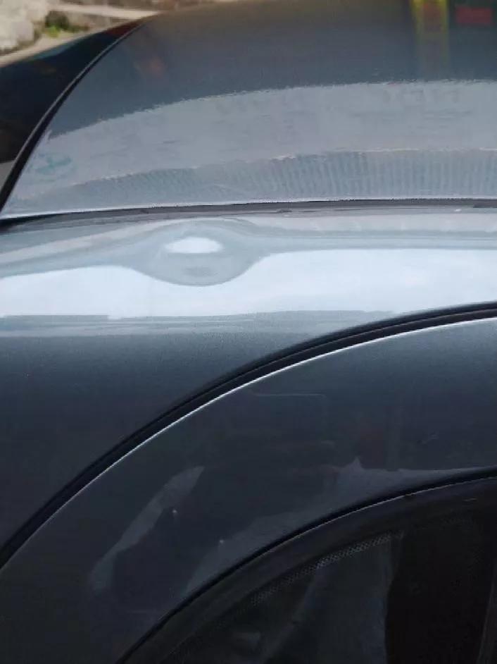 车顶凹陷修复保留原车漆,自己动手修复车翼子板凹坑