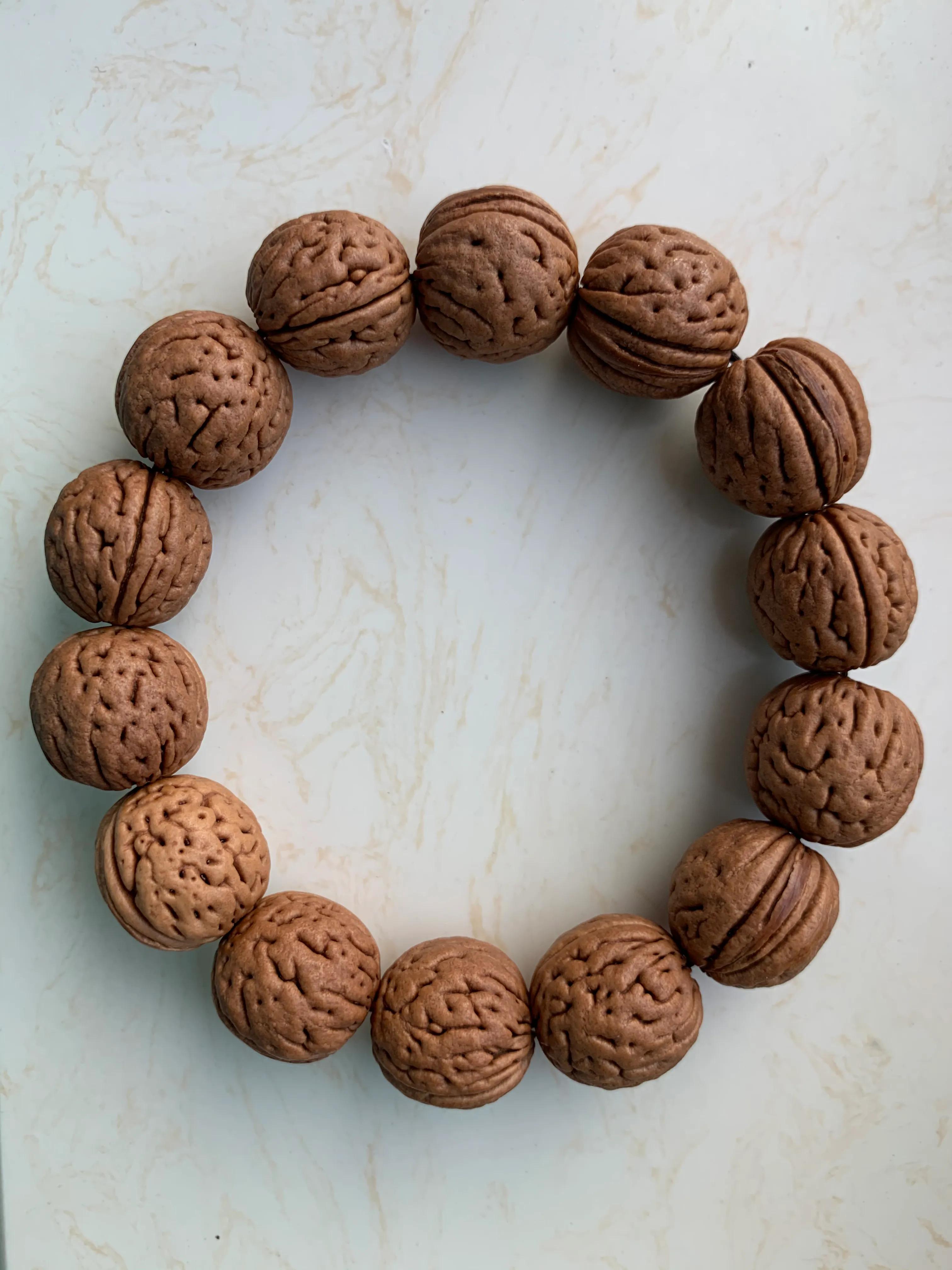 自制桃核手串的做法,自制桃核手串绳结视频